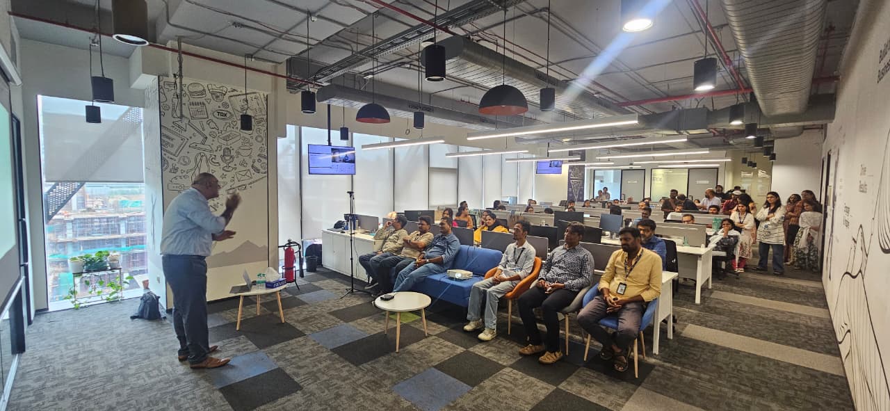 Dr. Handa presenting to a corporate audience